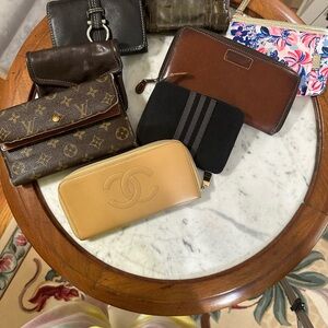 Selling a bundle of wallets AS IS.   CC. LV. HERMES CANVAS